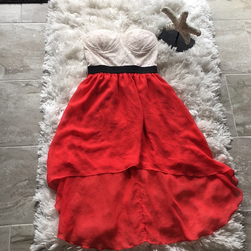 Red and white high low dress with a strap back